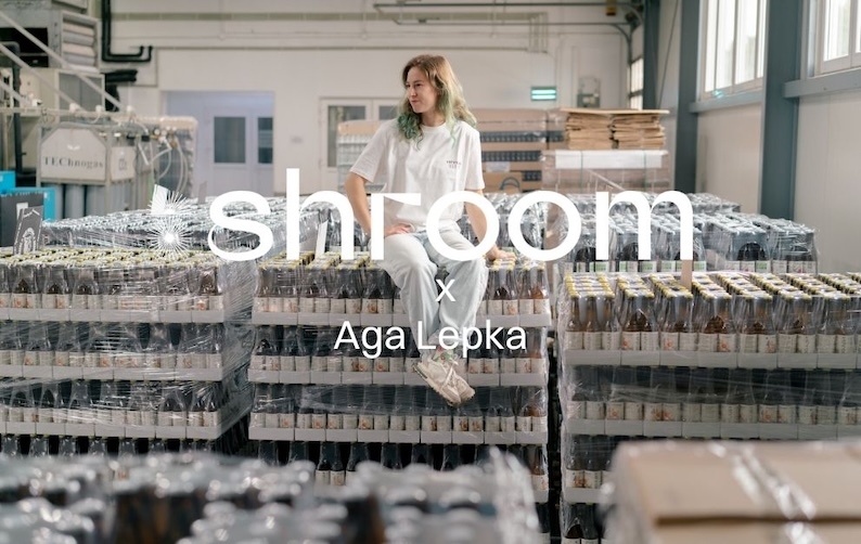 shroom co founder aga lepka sitting on pallets